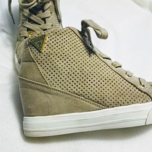 Guess hidden platform tennis shoe.